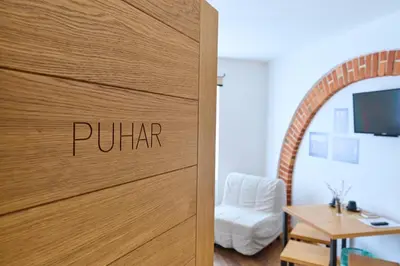 a sliding door with the word pilar written on it at Old Parish House in Bled