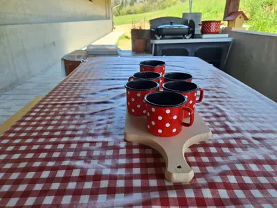 a table with red and white polka dot cups on a table at Šipk -FREE-PARKING-BREAKFAST-TERRACE in Vojnik
