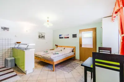 a bedroom with a bed in a room at Apartma Vučič in Bovec