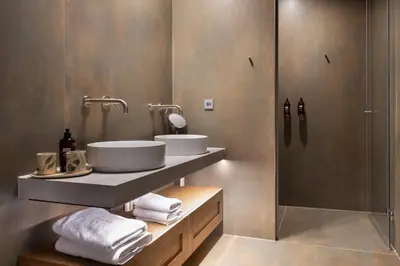 a bathroom with two sinks and a shower at Hiša Marija House in Miklavž pri Ormožu