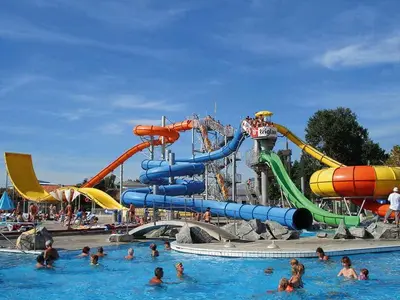 a group of people in the water at a water park at BRUNARICA VINTAGE 83 - nastanitev z vključenimi kopalnimi kartami - with Thermal Riviera Tickets included in Brežice