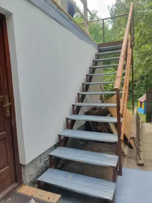 a set of stairs leading up to a building at Apartment with one room-LUCIA in Selo