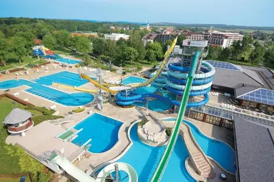 an aerial view of a water park with a roller coaster at Apartments Prekmurska vas - Vital Resort in Moravske Toplice