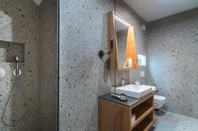 a bathroom with a sink and a shower at Gora Luxury Apartments in Kranjska Gora