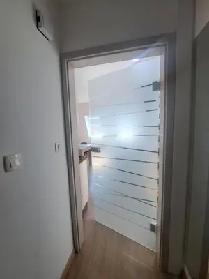 a door leading into a room with a hallway at Apartma Misha in Bovec