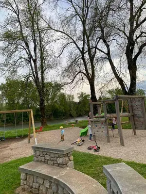 a group of children playing in a park at Apartma Tom in Metlika