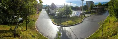 an aerial view of an empty street in a park at Kamp Tura- camping pitch only in Vipava