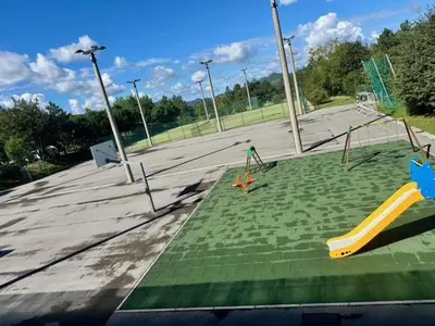 an empty playground with a slide at Kamp Tura- camping pitch only in Vipava