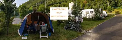 a tent is set up on the side of a road at Kamp Tura- camping pitch only in Vipava