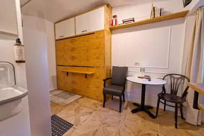a small dining room with a table and chairs at Apartment Econte near old town in Ljubljana
