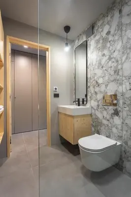 a bathroom with a toilet and a sink and a shower at Alpine Nest Bovec in Bovec