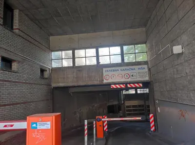 an entrance to a subway station with a sign on it at MCS Metro Residence in Ljubljana