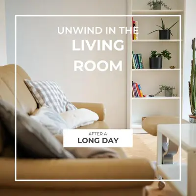 a living room with a couch in a living room at Peaceful City Stay in Ljubljana