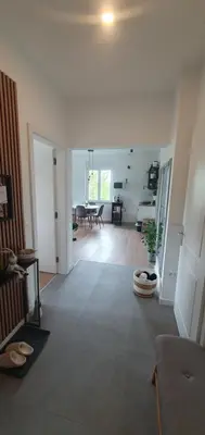 a room with a living room and a dining room at Gala Lenassi in Kamnik