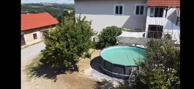 an aerial view of a house with a swimming pool at Apartma Martin in Miklavž pri Ormožu
