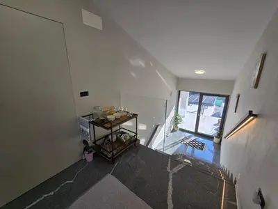 an overhead view of a room with a hallway at Nova Nest from Granite Getaways in Nova Gorica