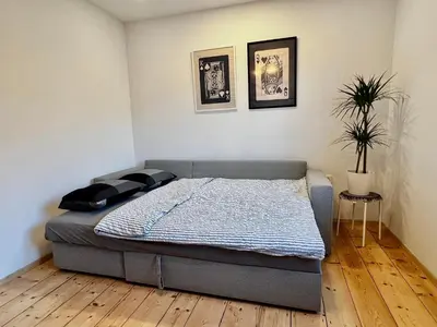 a bedroom with a bed in a room at St Mountain Escape in Žirovnica