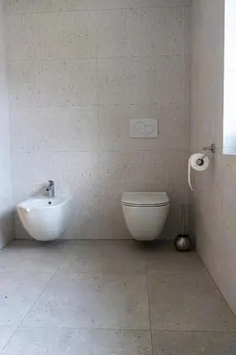a bathroom with a sink and a toilet in it at Apartment Tanja 3 Bedroom, Mountain View & Family Stay in Golnik