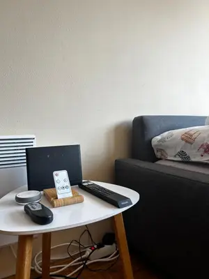 a table with a laptop and a keyboard and mouse on it at Apartma Giorgo in Bovec