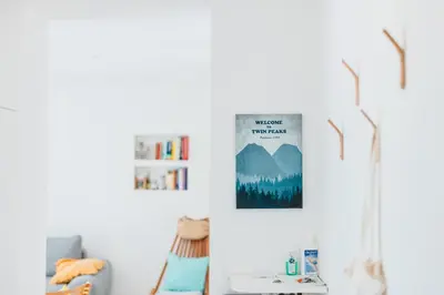a living room with a picture on the wall at Gatsby's Place in Ljubljana