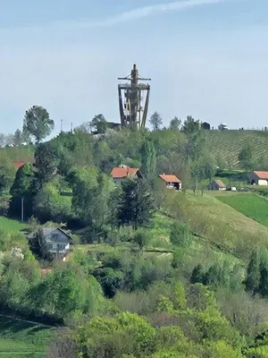 a hill with a tower on top of it at Hiška Jureš in Ljutomer