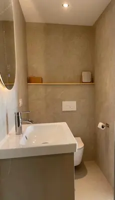 a bathroom with a sink and a toilet at Vipava View Studio Apartments in Šempas
