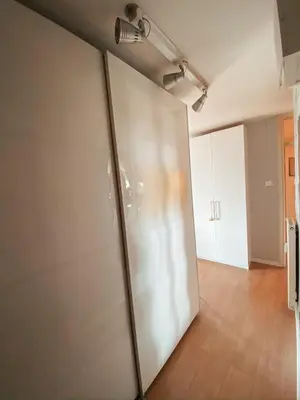 a sliding glass door in a room at Charming Apartment Siska in Ljubljana