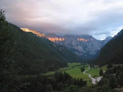 a view of a valley with mountains in the background at Guest House and Museum Firšt in Solčava