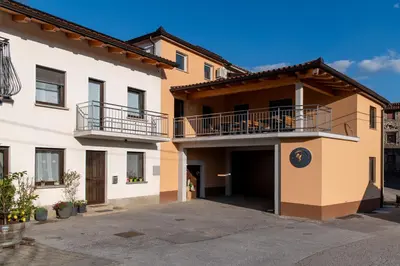 a large apartment building with a garage at Apartments Pr' Užlejbvih in Podnanos