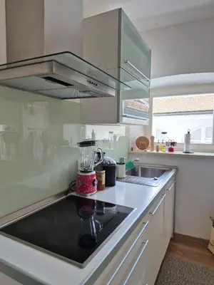 a kitchen with a blender on top of a counter at Valle Apartment City Center in Ljubljana