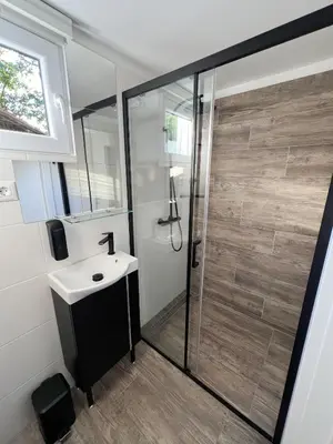 a bathroom with a shower and a sink at Hiška pod hrastom, G110 Podčetrtek, Aqualuna, Olimia in Podčetrtek
