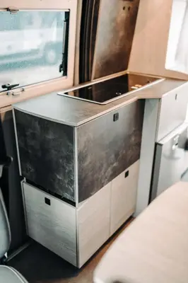 a kitchen in an rv with a sink at Robeta Ares in Šenčur