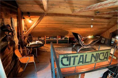 a living room with a boat in a cabin at Apartment Tlaka in Gornji Grad