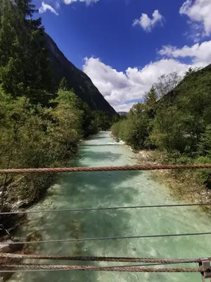 a view of a river from a bridge at Idina domačija in Trenta