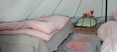 a bedroom with two beds and a tent at CAMP THEA, Glamping tent yurtas in Rose resort in Mrše