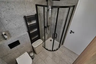 an overhead view of a shower in a bathroom at Green Alpine Nest in Komenda
