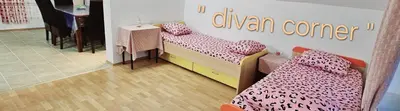 a room with two twin beds in a store at Cozy ap rooms 2nd floor near Capital of Slovenia in Ljubljana