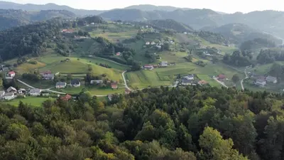 an aerial view of a village in the hills at Sunny Karla apartment Dramlje in Dramlje