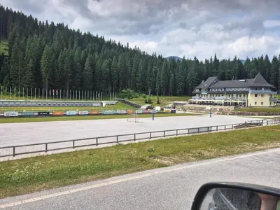 a view of a race track in front of a building at Koča na Kranjski dolini Krnica 93 a,Pokljuka in Zgornje Gorje