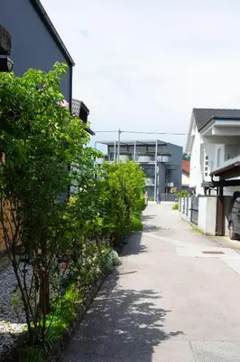 an empty street with a building in the background at Apartment Studio Green in Ljubljana