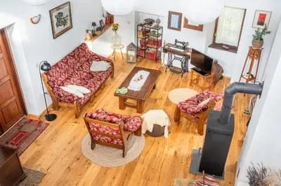an overhead view of a living room with a wood stove at Rustic House in Vipava Valley