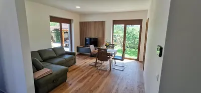a living room with a couch and a table at Apartment Ratek in Ivanjkovci