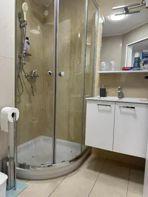a bathroom with a shower and a sink at Apartments Dani in Postojna