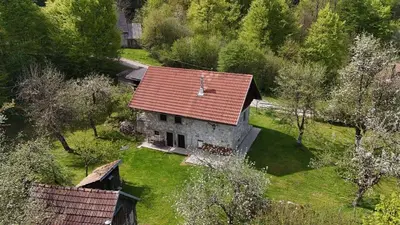 an aerial view of a house with a red roof at Apartment Olga