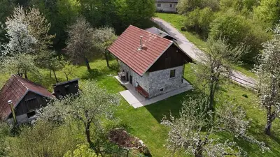 an aerial view of a house with a red roof at Apartment Olga