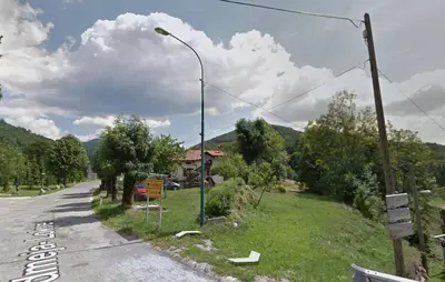 a street light on the side of a road at Apartma Dajana in Lokve