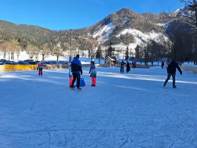 a group of people playing in the snow at Luna's Mountain House - Jezersko in Zgornje Jezersko