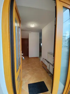 a view of a hallway with a door and a room at Frane House in Knežak
