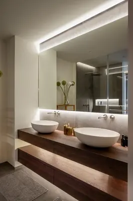 two sinks on a wooden counter in a bathroom at Castle View Penthouse in Ljubljana