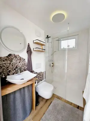 a bathroom with a sink and a toilet and a shower at Cozy Fizio Dome in Gradišče v Slovenskih Goricah